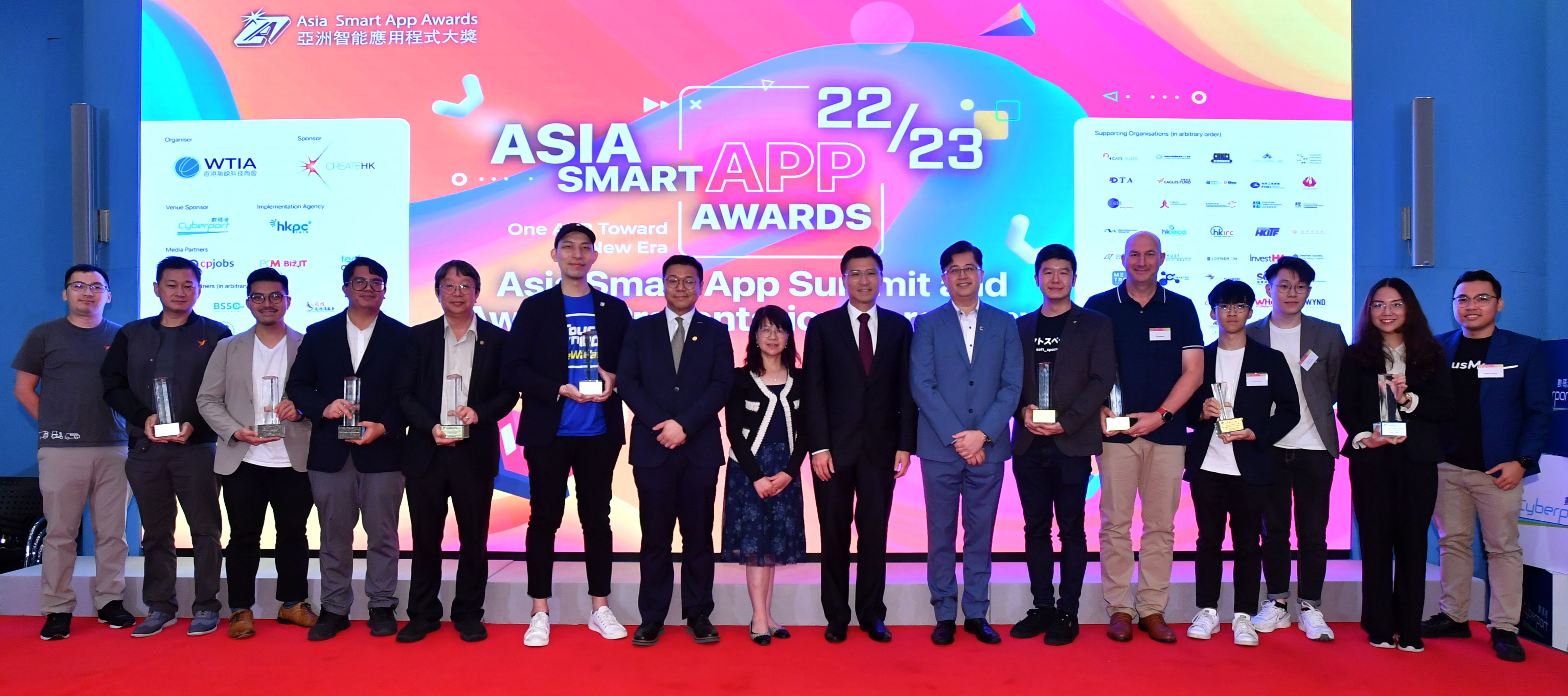 Winners and the presenter of the