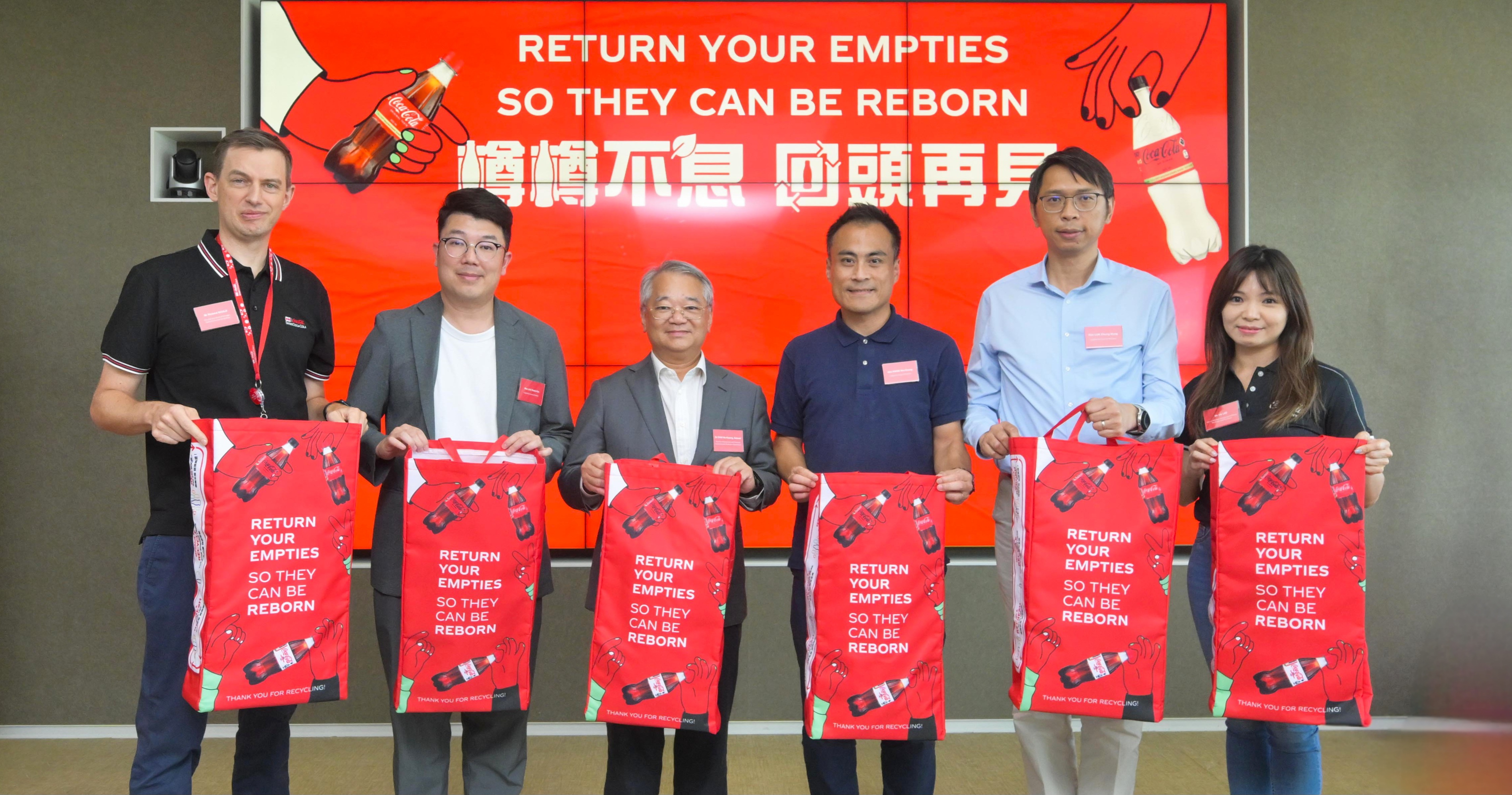 Coca-Cola has become the first enterprise in Hong Kong to recycling plastic bottles into new ones leveraging its own facilities. The launch event was graced by Dr Samuel CHUI, JP, Director of Environmental Protection (third from the left), Hon LAU Kwok-fan, MH, JP, Chairman, Panel on Environmental Affairs, Legislative Council (second from the left); Hon KWOK Wai-keung, BBS, JP, Member (Functional Constituency – Labour), Legislative Council (third from the right); Hon LUK Chung-hung, JP, Member, Legislative Council (second from the right), Mr Richard GOULD, Director and General Manager, Swire Coca-Cola Hong Kong (far left); and Ms Iris LEE, General Manager, Hong Kong and Macau, The Coca-Cola Company (far right).