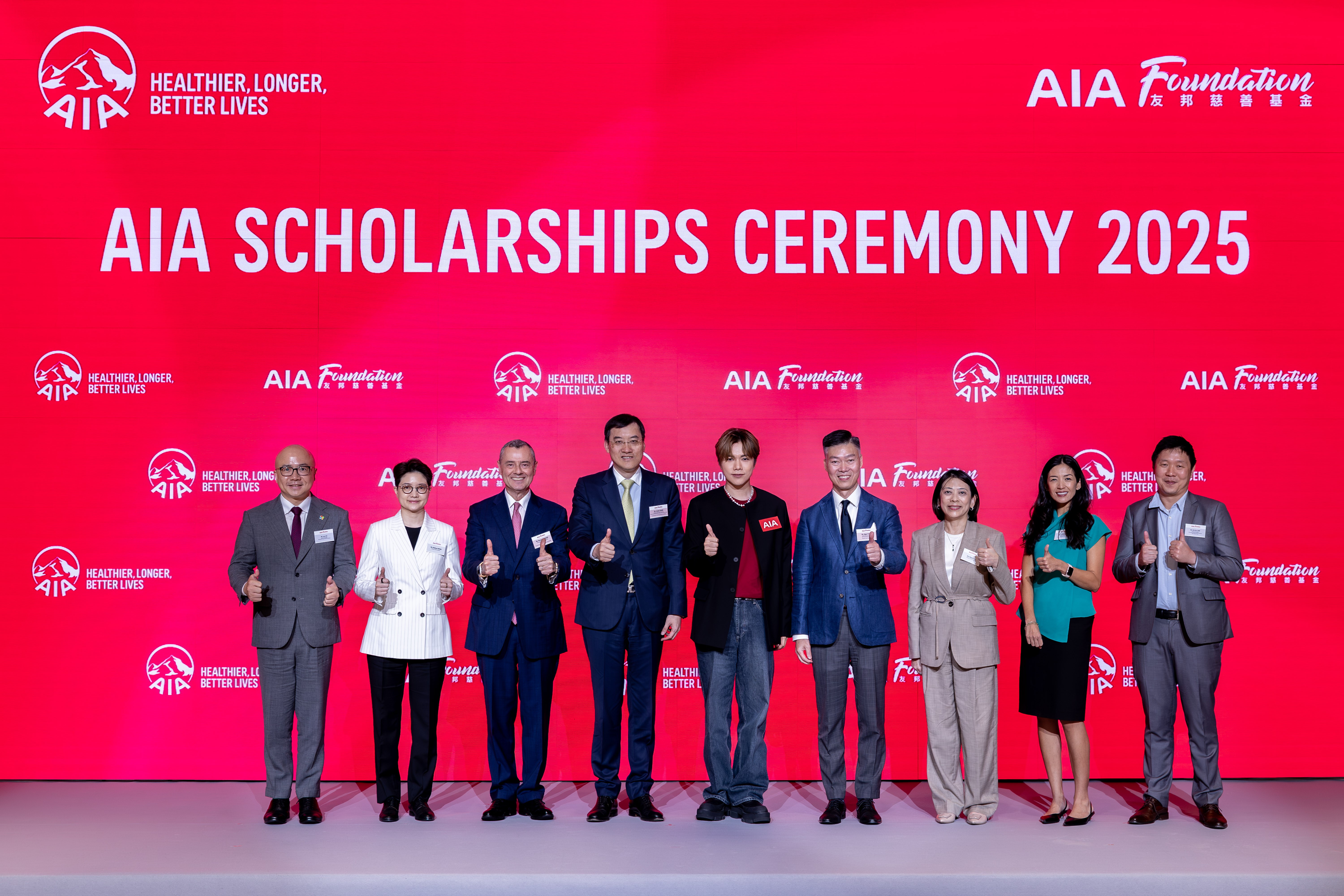 Mr. Jacky Chan, AIA Regional Chief Executive and Group Chief Distribution Officer; Co-chairman, AIA Scholarships Committee (fourth from left); Mr. Stuart A. Spencer, AIA Group Chief Marketing Officer; Co-chairman, AIA Scholarships Committee (third from left); Mr. Alger Fung, Chief Executive Officer, AIA Hong Kong & Macau; Director of AIA Foundation (fourth from right); Ms. Melissa Wong, Chief Customer & Marketing Officer, AIA Hong Kong & Macau; Director of AIA Foundation (second from left); and Ms. Maylie Lee, Chief Human Resources Officer, AIA Hong Kong & Macau; Director of AIA Foundation (third from right), along with Mr. Hins Cheung, singer and AIA Rethink Healthy ambassador (fifth from right) and representatives from partners including Microsoft Hong Kong and Macau, HandsOn Hong Kong, and AIA Vitality Hub, announced the launch of “AIA Purpose in Action”.